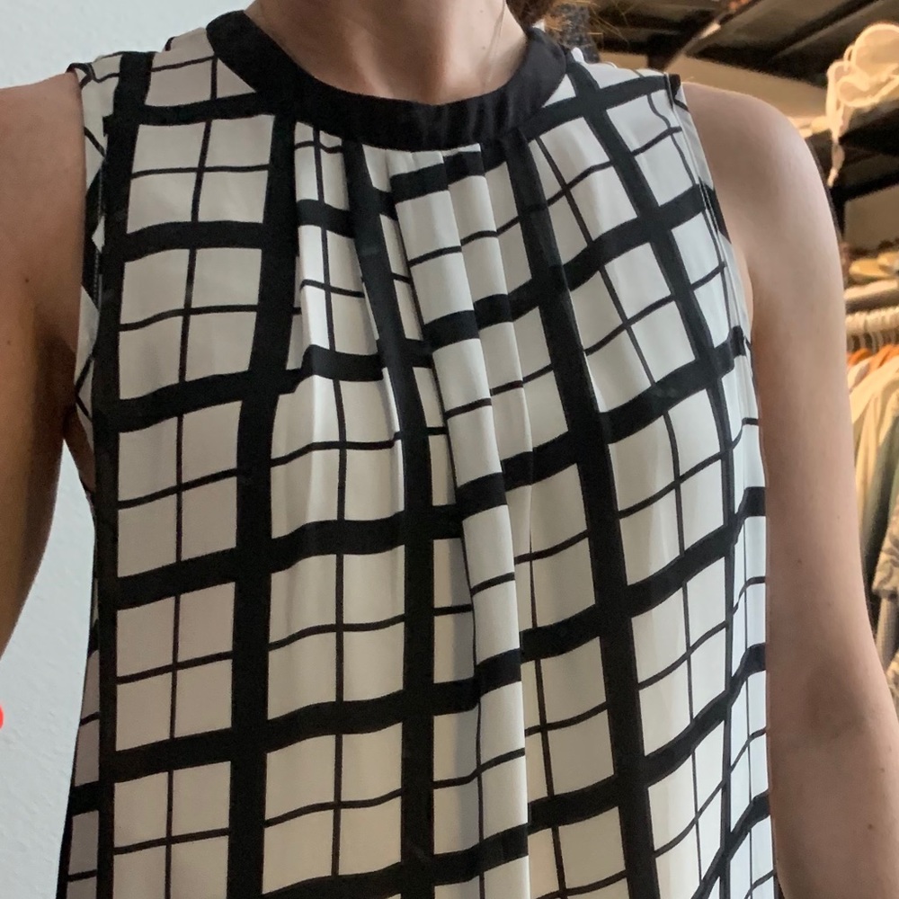 Black and white silk tank top.